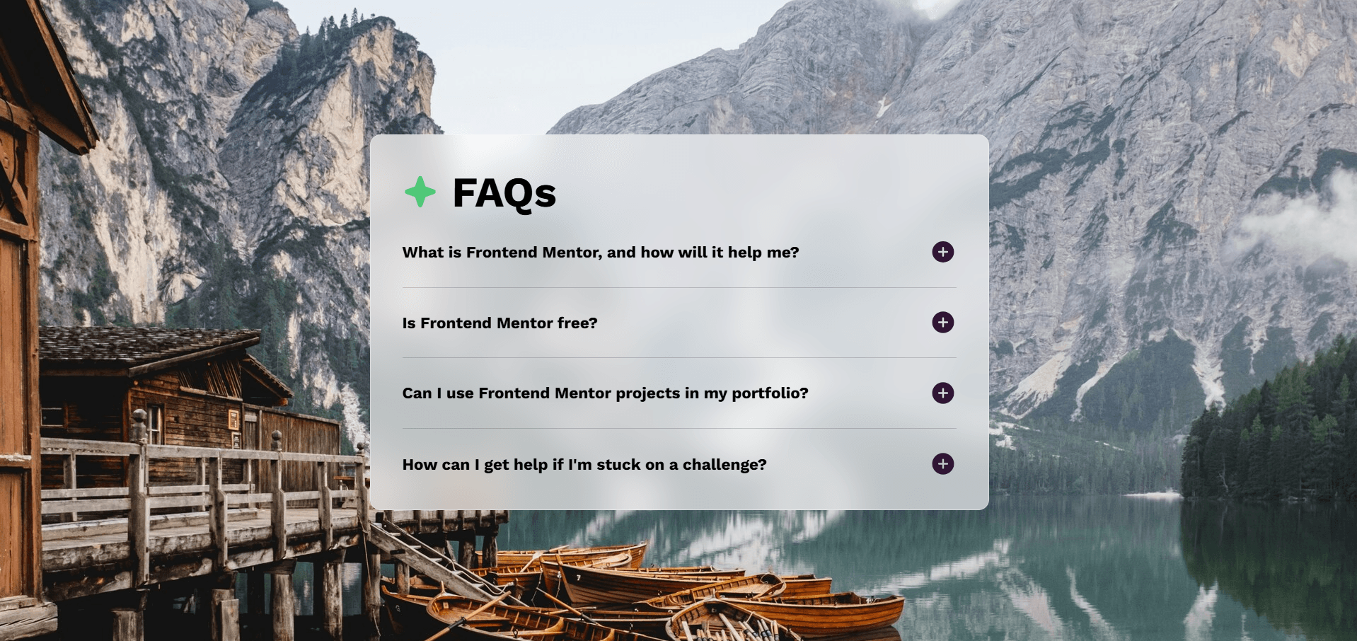 FAQ accordion on a frosted glass panel over a photo of a mountain lake with wooden rowing boats.
